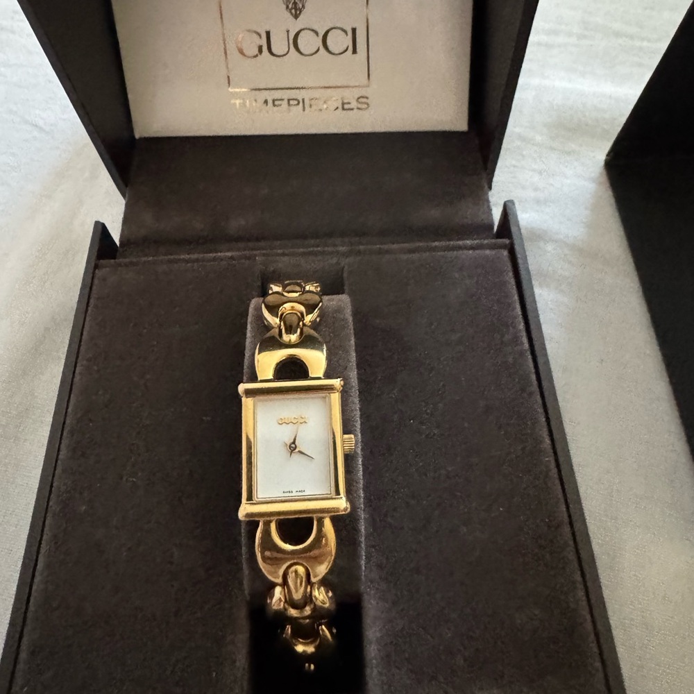 Gucci Women's Gold Watch with White Dial